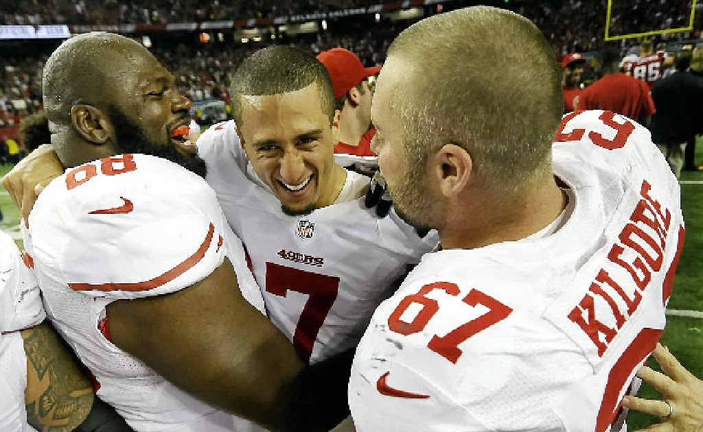 GAME ON: San Francisco 49ers’ Colin Kaepernick (7) celebrates with Leonard Davis and Daniel Kilgore (67) after advancing to to Superbowl XLVII. GAME ON: San Francisco 49ers’ Colin Kaepernick (7) celebrates with Leonard Davis and Daniel Kilgore (67) after advancing to to Superbowl XLVII.